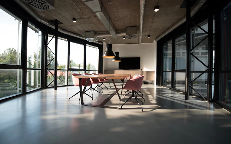 Empty meeting room with floor-to-ceiling windows
