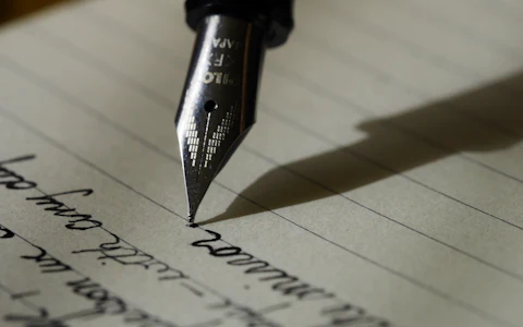 Notebook and stationery on a working desk